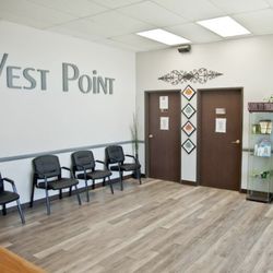 West Point Physical Therapy Center - Our waiting room, with seating and water available.