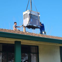 Grumpy's HVAC - David and Antonio, Grumpy's HVAC, installing heating & air.
