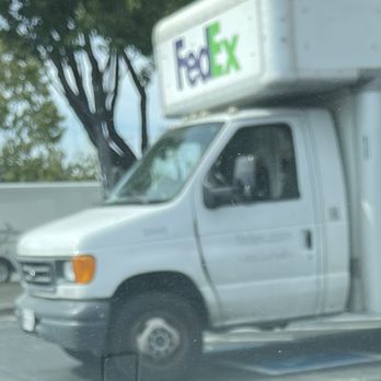 FedEx Office Print & Ship Center - Yes the blue handicap sign.  Driver did not care - Printing Services Near Me - San Leandro, California