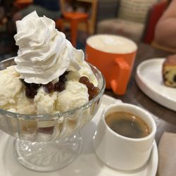 Four Echoes - Vanilla affogato, coffee popping boba , cool whipped cream .