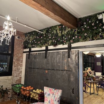Local Barre - Love this room with the flower wall and the barre weights - Barre Classes Near Me - Hoboken, New Jersey