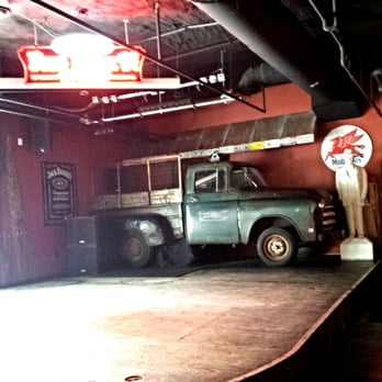 Red Rock Saloon - The small parking lot outside the restaurant fills up quickly, forcing a resourceful patron to park their vehicle on the stage. jk - Pubs Near Me - Madison, Wisconsin Red Rock Saloon - The small parking lot outside the restaurant fills up quickly, forcing a resourceful patron to park their vehicle on the stage. jk - Pubs Near Me - Madison, Wisconsin