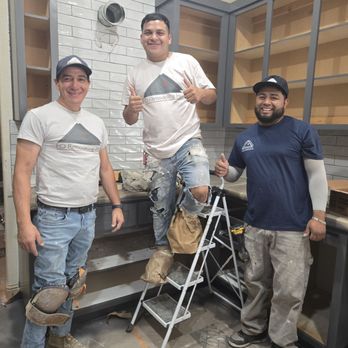 Fo Remodeling - One of the crew members wearing paper bags for shoes. Lol - General Contractors Near Me - Elk Grove, California