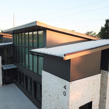 America's Choice Roofing & Seamless Gutters - Dudley Construction- 24 Gauge Galvalume Double Lock Standing Seam and Black Seamless Gutters - General Contractors Near Me - College Station, Texas