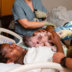 Supported Serenity Doula Care - Baby being born