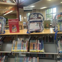 Sam Gary Branch Library - Books and bags on the go.