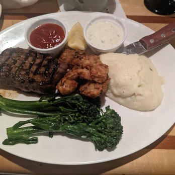 Anthony's HomePort - Steak with fried oysters mashed potatoes and broccolini - Seafood Near Me - Des Moines, Washington Anthony's HomePort - Steak with fried oysters mashed potatoes and broccolini - Seafood Near Me - Des Moines, Washington
