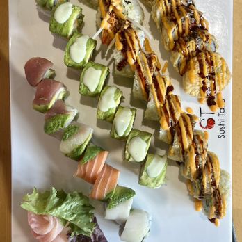 Sushi Taku - Red Snapper Nigiri, Rainbow Roll, Vegetable Deluxe Roll, Godzilla Roll, very top right I don't remember but was very good! - Japanese Near Me - Chicago, Illinois Sushi Taku - Red Snapper Nigiri, Rainbow Roll, Vegetable Deluxe Roll, Godzilla Roll, very top right I don't remember but was very good! - Japanese Near Me - Chicago, Illinois