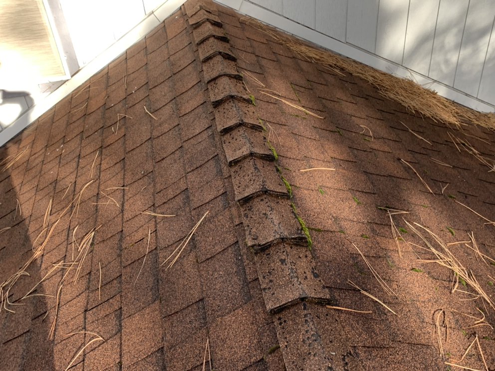 Slide of John Stahl Roofing