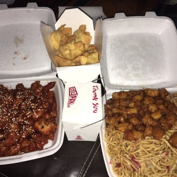 China Garden - Cream cheese wontons, Sesame chicken with white rice (in the small container), and the orange chicken combo plate. - Chinese Near Me - Modesto, California