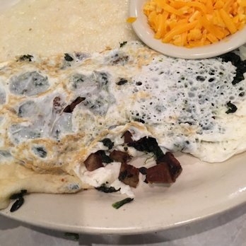 Harry's Restaurant - Egg white omelette with spinach and turkey sausage. Grits and cheese on side - Breakfast & Brunch Near Me - Houston, Texas
