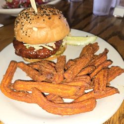 Huge Korean BBQ chicken sandwich with sweet potato fries, AMAZING and 2 napkins meal.