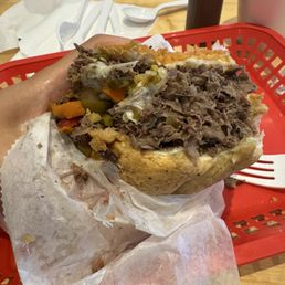 Big Italian beef with hot peppers and mozzarella Big Italian beef with hot peppers and mozzarella