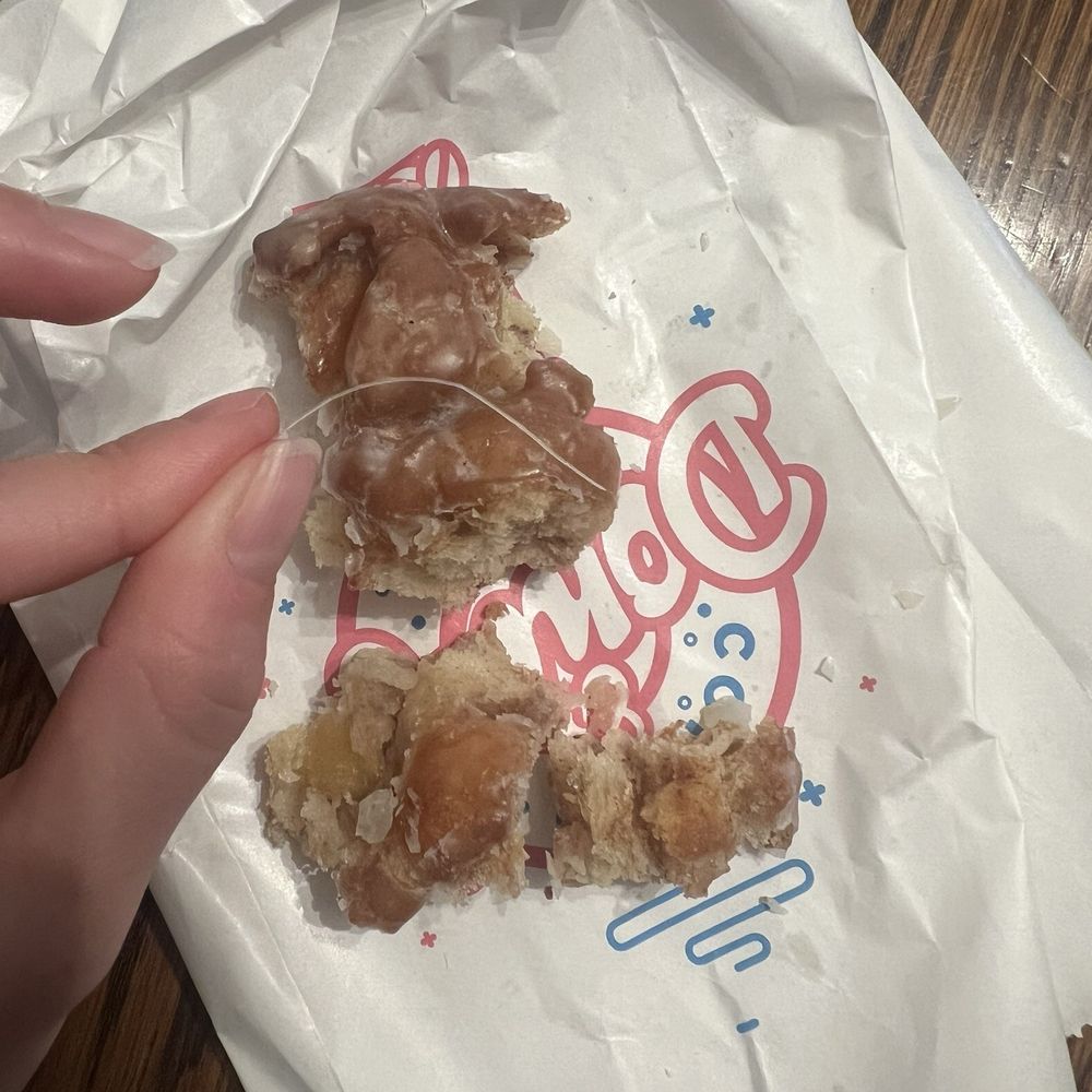 A piece of plastic baked into the donut A piece of plastic baked into the donut