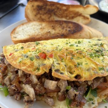 Rising Roost - Roasted pork omelette - Coffee & Tea Near Me - Vieques, Puerto Rico Rising Roost - Roasted pork omelette - Coffee & Tea Near Me - Vieques, Puerto Rico