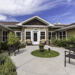 Highline Place Memory Care - Secured outdoor patios with raised gardens.