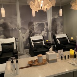 Heavenly Foot Massage - Both sides of the room hold three chairs for a total of six. The lights go down for a perfectly relaxing experience.