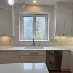 Mr Backsplash - Stunning ceramic picket fence sheet mount backsplash going up and over the window