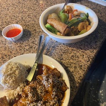 Heights Asian Cafe - Sesame chicken with Side Brown Rice and Chineses Egg Roll 1 - Chinese Near Me - Houston, Texas Heights Asian Cafe - Sesame chicken with Side Brown Rice and Chineses Egg Roll 1 - Chinese Near Me - Houston, Texas