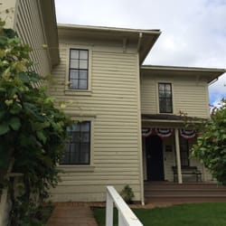 Outside of the house.