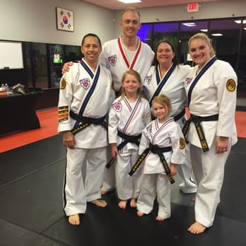 Built By Martial Arts - A father and 2 girls who earned their Black Belts!  What a great moment that these girls will remember, forever. - Taekwondo Near Me - Evans, Georgia