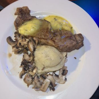 Maxine's On Shine - NY Strip Steak with mashed potatoes and mushrooms. - New American Near Me - Orlando, Florida Maxine's On Shine - NY Strip Steak with mashed potatoes and mushrooms. - New American Near Me - Orlando, Florida