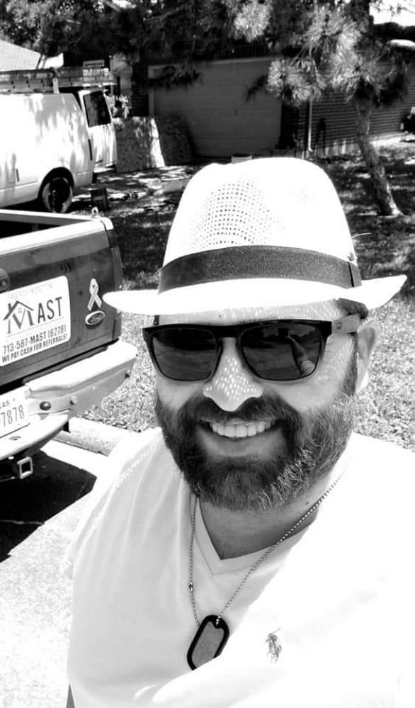 Slide of Mast Roofing & Construction