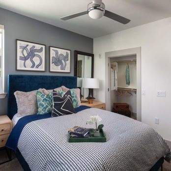 Camden North End Apartments - Contemporary style bedroom with ceiling fan and ensuite walk in closet - Apartments Near Me - Phoenix, Arizona Camden North End Apartments - Contemporary style bedroom with ceiling fan and ensuite walk in closet - Apartments Near Me - Phoenix, Arizona