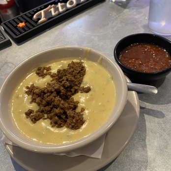 Sazón Tex-Mex and More - Large queso with beef - Mexican Near Me - Dallas, Texas Sazón Tex-Mex and More - Large queso with beef - Mexican Near Me - Dallas, Texas
