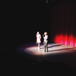 a man and a woman on stage a man and a woman on stage