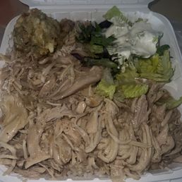 Roasted turkey in gravy with stuffing and salad Roasted turkey in gravy with stuffing and salad