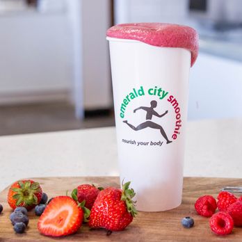 Emerald City Smoothie - strawberries and blueberries on a cutting board - Juice Bars & Smoothies Near Me - Redmond, Washington Emerald City Smoothie - strawberries and blueberries on a cutting board - Juice Bars & Smoothies Near Me - Redmond, Washington