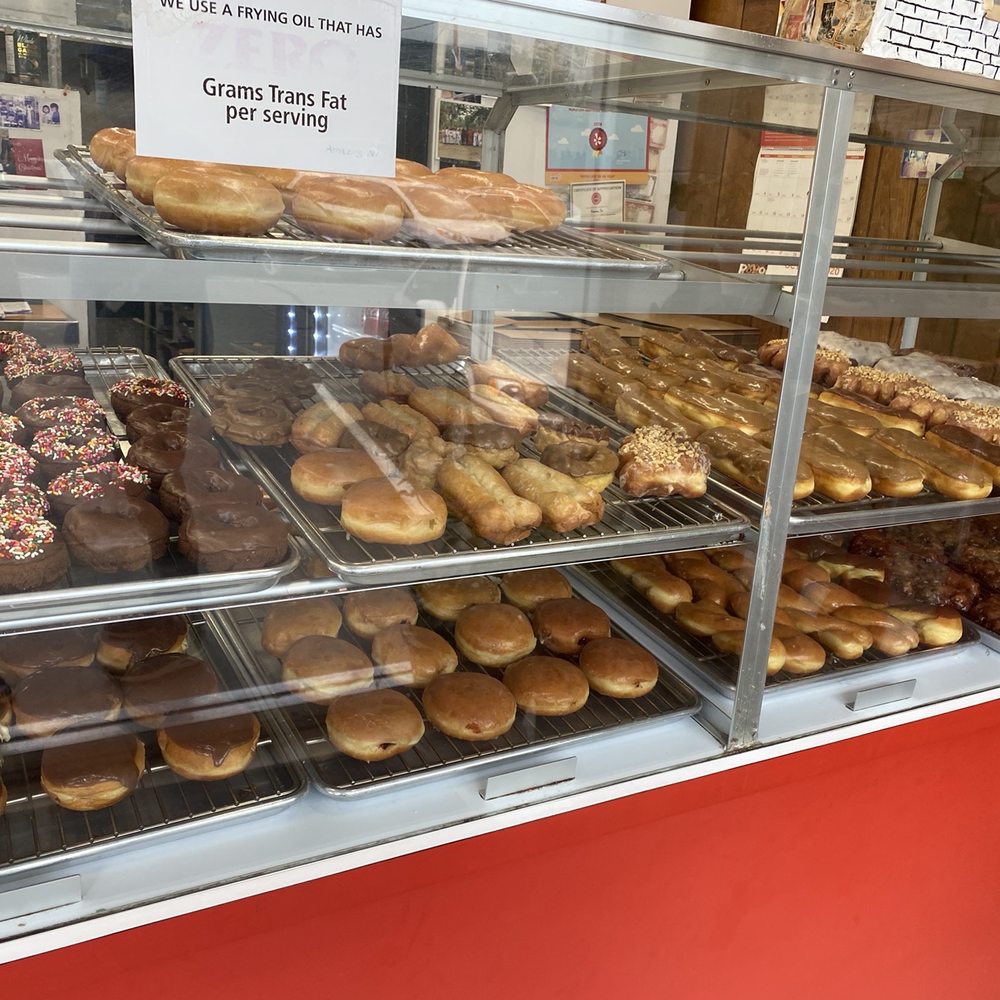 a display of a variety of donuts a display of a variety of donuts