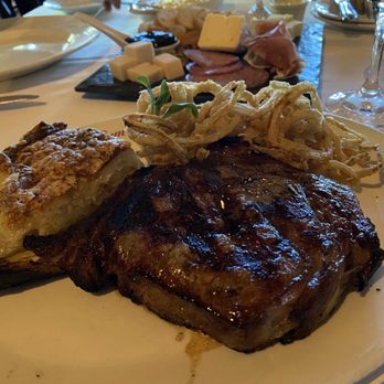 Summit House - Rob-eye with potatoes au gratin and onion rings - Steakhouses Near Me - Fullerton, California Summit House - Rob-eye with potatoes au gratin and onion rings - Steakhouses Near Me - Fullerton, California