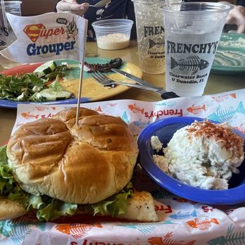 Frenchys Outpost Bar & Grill - Super-Grouper 8oz sandwhich with home made potato salad - Bars Near Me - Dunedin, Florida