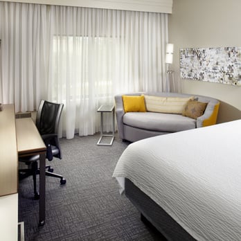 Courtyard by Marriott Detroit Brighton - Our guest room showcases a fresh and progressive design that provides plenty of outlets and comfortable spaces for both relaxation and work. - Hotels Near Me - Brighton, Michigan Courtyard by Marriott Detroit Brighton - Our guest room showcases a fresh and progressive design that provides plenty of outlets and comfortable spaces for both relaxation and work. - Hotels Near Me - Brighton, Michigan