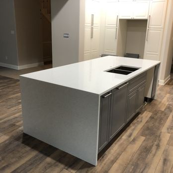 Lucinay Granite - Beautiful Mitered edge island our Fabricators and Installers worked on. 1/2 - General Contractors Near Me - Bertram, Texas Lucinay Granite - Beautiful Mitered edge island our Fabricators and Installers worked on. 1/2 - General Contractors Near Me - Bertram, Texas