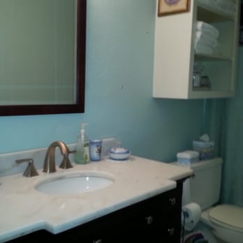 Historic Holle House - Marble vanity in full bath. Home also features a half bath between the two bedrooms. - Vacation Rentals Near Me - Brenham, Texas Historic Holle House - Marble vanity in full bath. Home also features a half bath between the two bedrooms. - Vacation Rentals Near Me - Brenham, Texas