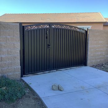 Marquez Iron Work - Black Iron Double Gate with Sheet Metal and Casting Corona CA - Fences & Gates Near Me - Ontario, California Marquez Iron Work - Black Iron Double Gate with Sheet Metal and Casting Corona CA - Fences & Gates Near Me - Ontario, California