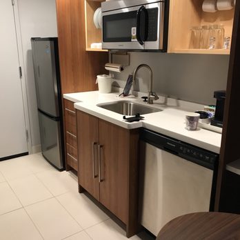 Home2 Suites by Hilton Roanoke - Kitchenette includes apartment-sized fridge, dishwasher, rollout dining table, service for 6 with glasses, mugs, plates, bowls,silver. - Hotels Near Me - Roanoke, Virginia Home2 Suites by Hilton Roanoke - Kitchenette includes apartment-sized fridge, dishwasher, rollout dining table, service for 6 with glasses, mugs, plates, bowls,silver. - Hotels Near Me - Roanoke, Virginia