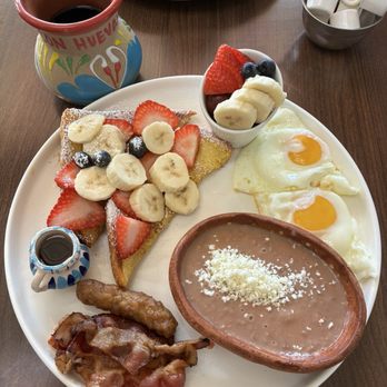 Con Huevos - El Classico, beans instead of potatoes. Look at the cute little mini-jarrito for the syrup. - Mexican Near Me - Los Angeles, California Con Huevos - El Classico, beans instead of potatoes. Look at the cute little mini-jarrito for the syrup. - Mexican Near Me - Los Angeles, California