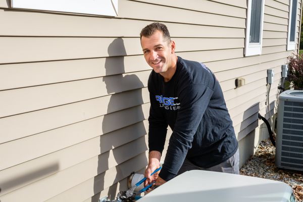 Ridgeco Plumbing & Heating Logo