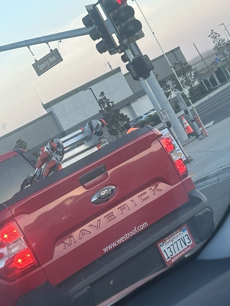 Slide of Western Roofing Service