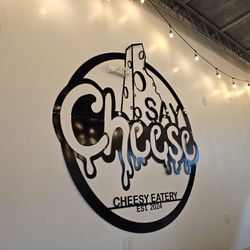 Say Cheese - Wall logo