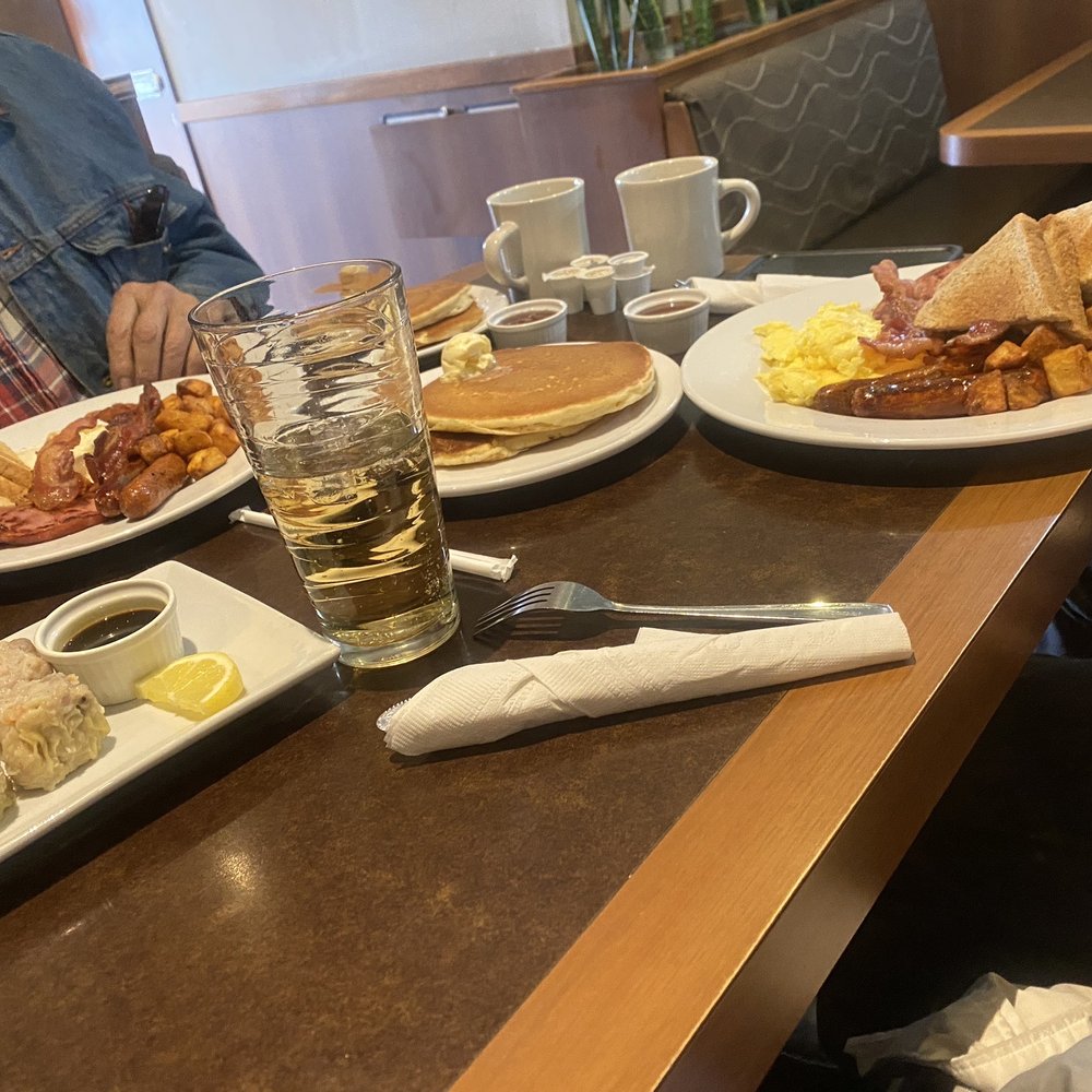 Chowkeni - Chow breakfast special ( 2 bacon sausage ham pancakes and eggs ) plus toast & their dumplings - Food Trucks Near Me