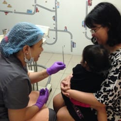 Children's Dental Center - Dr. Marie explaining what needs to be done