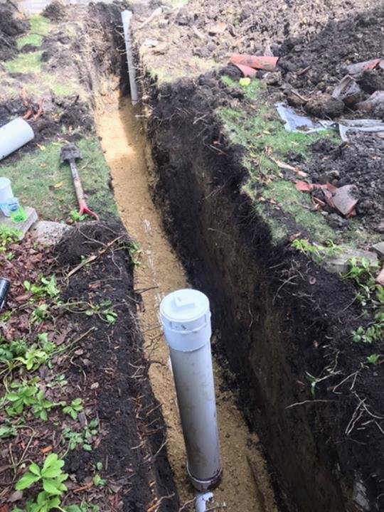 Slide of Suburban Sewer & Septic