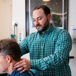 Brenner Chiropractic - Sitting treatment to the neck.