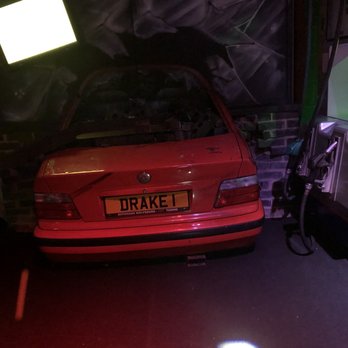 Junkyard Golf Club - Really random photo of this car in one of the courses - Bars Near Me - Oxford, OXF