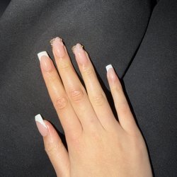 Top Coat Nails - Price is reasonable and they did it the exact way I wanted it! The time management was great and it was pretty.